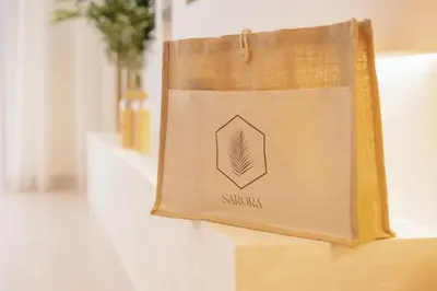a paper bag hanging on a wall at Sarora One - Japandi-Inspired 2-Bedroom Apartment in Act One, Downtown Dubai with Balcony & Burj Khalifa View in Dubai