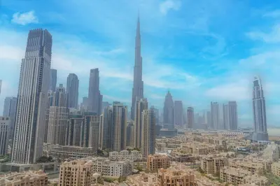 a view of a large city with tall buildings at Luxury Stay Skyline Burj View in Dubai