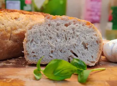 a loaf of bread sitting on top of a cutting board at dreams stay in Dubai