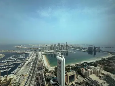 an aerial view of a city with a river and buildings at Frank Porter - Elite Residence, Dubai Marina in Dubai