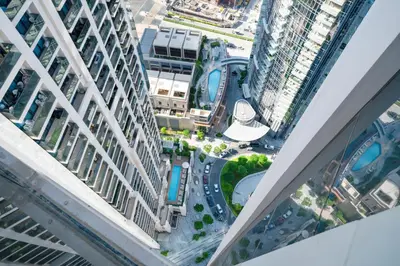 an aerial view of a city with tall buildings at Act tower 2BR, near burj khalifa in Dubai