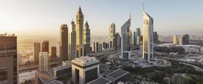 an aerial view of a city with tall buildings at 54th Floor Burj Khalifa&Mall Access Infinity Pool in Dubai