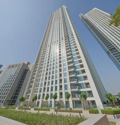 a tall building with two tall buildings at Burj View Chic 2BR Downtown Dubai in Dubai
