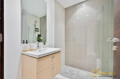 a bathroom with a sink and a shower at Majestic 3BR Villa in DH2 by Deleguest in Dubai