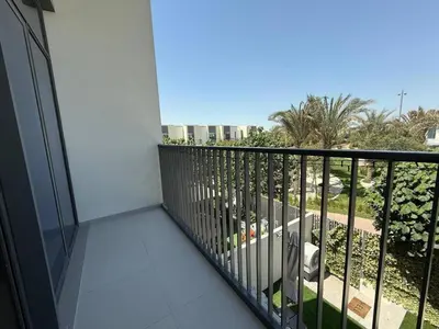 a balcony with a view of the city at Luxe 4BR Villa with Park View - Next to Pool Oasis - Ranches 3 - Sleep 10 in Dubai