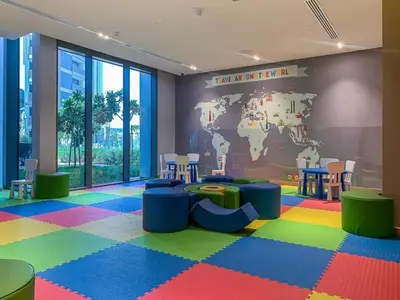 a childrens room with a world map on the wall at Sunset Sea View at 5242 Emaar in Dubai