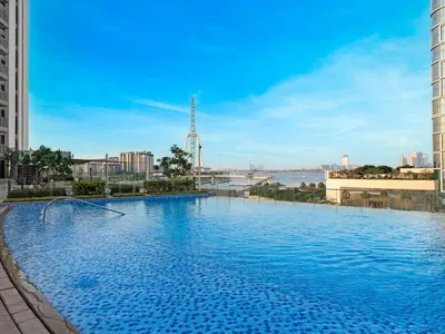 a large swimming pool on the roof of a building at Sunset Sea View at 5242 Emaar in Dubai