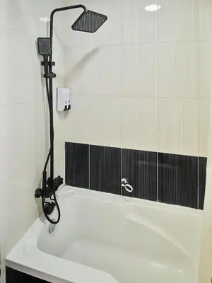 a shower in a bathroom with a white sink at Best location in Marina & jbr and marina view 1 minute from JBR in Dubai