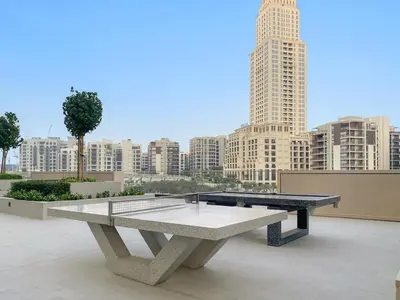 a ping pong table sitting on top of a building at FIRST CLASS 1BR Luxe Living with a View in Dubai