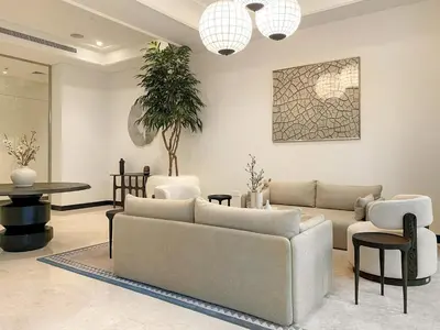 a living room with a couch and a table at FIRST CLASS 1BR Luxe Living with a View in Dubai