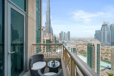 a balcony with a view of the city at 2BR Downtown Gem with Burj Khalifa and Fountain Views in Dubai