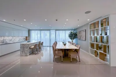a dining room with a table and chairs at Fantastic 2BR apartment Palm, Sea and Sunset Views in Dubai