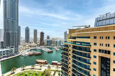 a view of a river in a city with buildings at Sparkle Tower by Swarovski, Full Marina View, 2min JBR & Metro, Sleeps 4 in Dubai