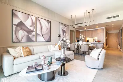 a living room with a couch and a table at The Smart Concierge - Stella Maris in Dubai