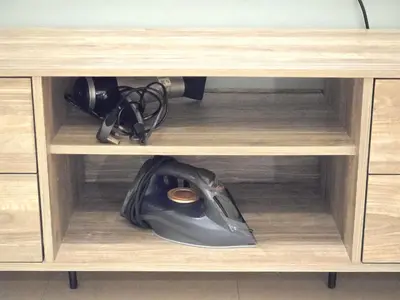 a wooden shelf with a computer mouse in it at Modern Studio Near Dubai World Trade Centre in Dubai