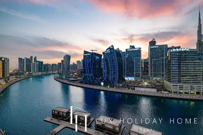 a view of a city with a river and buildings at LUX The Modern Binghatti Canal Suite 3 in Dubai