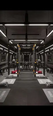 a gym with dumbbells in the middle at Luxury Modern Apt in JBR 2 MIN to BEACH in Dubai
