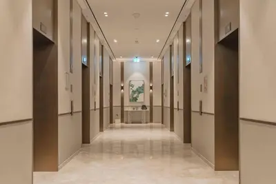 a hallway of an art gallery with a hallway of paintings at TRPS - Grande, Downtown - Full Burj Khalifa View, Luxury Furnished - Close to Dubai Mall in Dubai