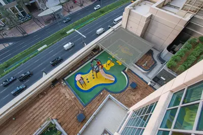 an aerial view of a house with a painting on the roof at Stylish 1BR in Downtown - 5 Min to Burj & Mall in Dubai
