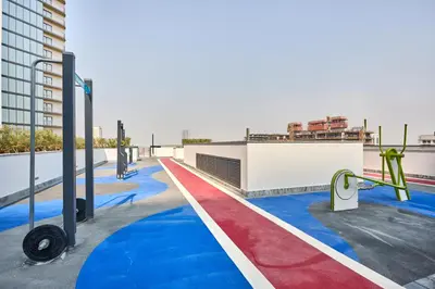 a building with a red white and blue painted floor at STAY BY LATINEM Luxury 1BR Holiday Home CA 1509 Near Downtown in Dubai