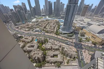 an aerial view of a city with tall buildings at 4BR Burj & Fountain View Luxe in Dubai