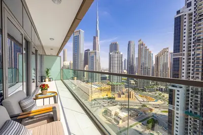 an apartment balcony with a view of the city at Fabulous 2 BR - Paramount Midtown in Dubai