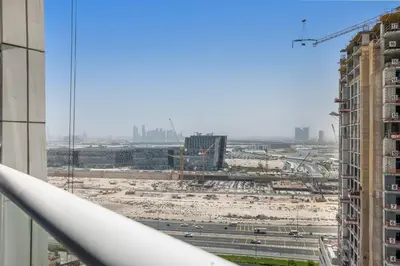 a view of a construction site from a building at 2BR Midtown Gem - Luxurious Apartment with Balcony in Dubai