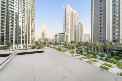 a view of a city skyline with tall buildings at Luxury 2BR Dubai Creek Harbour with Pool, Gym, Parking & Balcony Views in Dubai