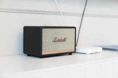 a small black radio sitting on a white shelf at Luxury 1BR Sea View Apt Address JBR Dubai in Dubai
