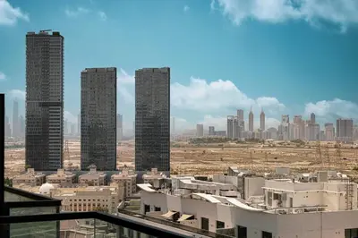 a view of a city skyline with tall buildings at Luxury Stay in JVC in Dubai