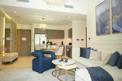 a living room with a couch and a table at Iconic Burj Khalifa, Fountain Views, Luxury 2BR in Sabkhah