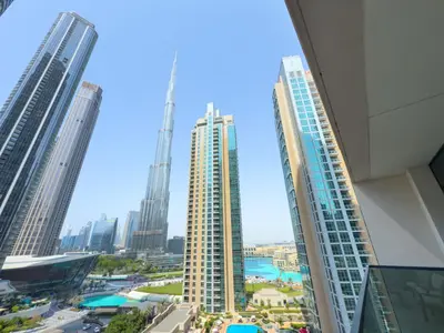a view of a city skyline with tall buildings at Iconic Burj Khalifa, Fountain Views, Luxury 2BR in Sabkhah