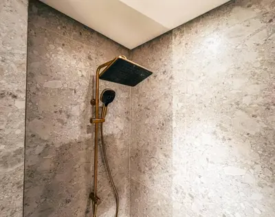a shower in a bathroom with a ceiling at Modern Place - Binghatti Azure 1244 in Dubai