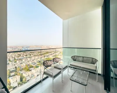 a living room with a view of a city at Modern Place - Binghatti Azure 1244 in Dubai