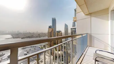 a balcony with a view of a city at Harbour Views - Chic Three Bed with Creek Views in Dubai
