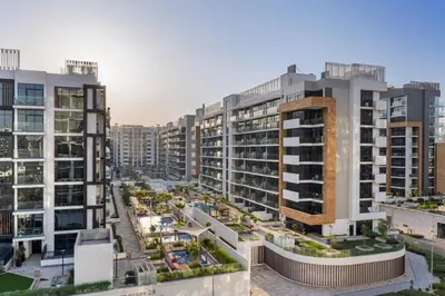 an aerial view of a city with tall buildings at Studio in Azizi with Pool and Gym Access in Dubai