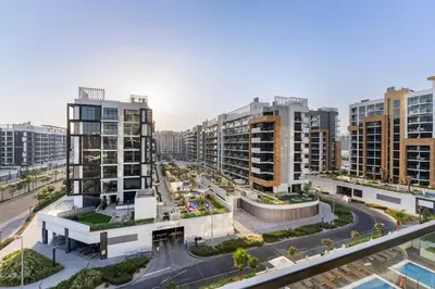 an aerial view of a city with tall buildings at Studio in Azizi with Pool and Gym Access in Dubai