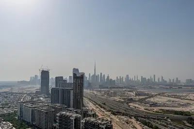 an aerial view of a city with tall buildings at HAVN - 2 Bedroom at The Crest, Dubai Skyline Views in Dubai