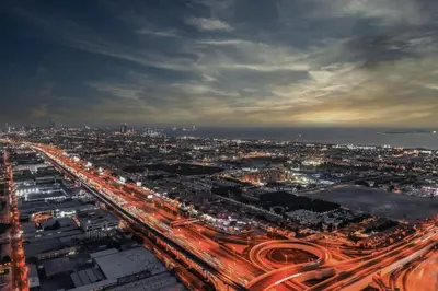 an overhead view of a city with traffic at night at Samani vacation homes 2217 in Dubai