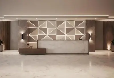 a lobby with a reception desk in a building at Elegant Apartment with Burj Khalifa View in Dubai