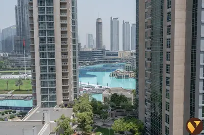 a view of a city with tall buildings at Vogue Downtown Boulevard Central near Burj Khalifa and Dubai Mall, Two Bedroom Apartment with Balcony and Burj Khalifa View, Access to all Amenities in Dubai