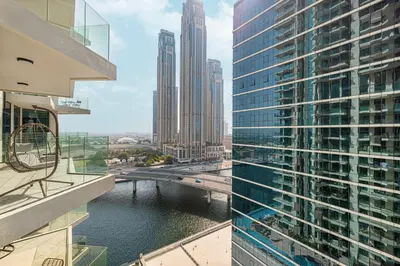 a view of a river between two tall buildings at Moon Stays - 5 PAX Missoni Flat - Canal View in Dubai