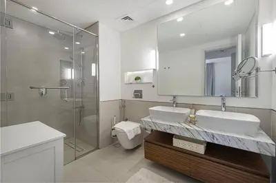 a bathroom with a sink and a shower and a toilet at StayMada - Lamtara Near Burj AlArab Beach Access in Dubai