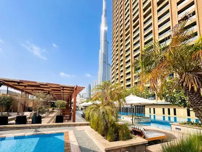 a view of the burj khalifa from a hotel with a pool at PVH - Burj Khalifa View Studio - Emaar Residence Fashion Avenue in Dubai