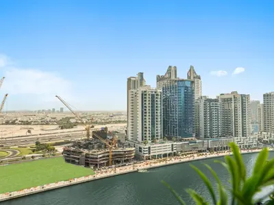 an aerial view of a city with tall buildings at BLVD - Stylish Stay with Private Jacuzzi and Canal View in Dubai