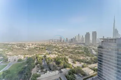 an aerial view of a city with a tall building at Close to Museum of the Future with Zaabeel Palace Views, Minutes from Dubai Mall And Burj Khalifa - Sky Gardens, DIFC by Deluxe Holiday Homes in Dubai