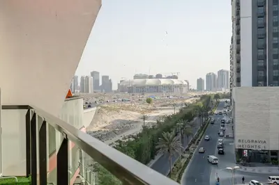 a view of a city from a balcony of a building at Stylish 1BR Retreat Huge Balcony in Dubai