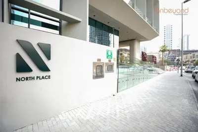 a north place sign on the side of a building at The Autograph-Art Meets Comfort in Dubai