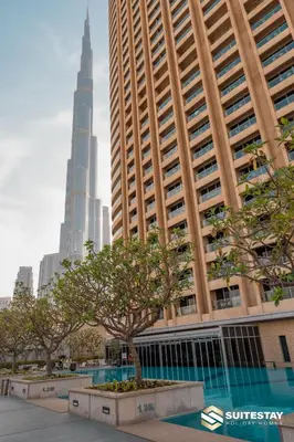 a view of the burj khalifa from the city at Dubai Mall Apartments by Suitestay in Dubai