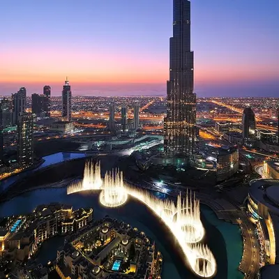 an aerial view of a city at night at Full Burj Khalifa Views at Burj Vista in Dubai
